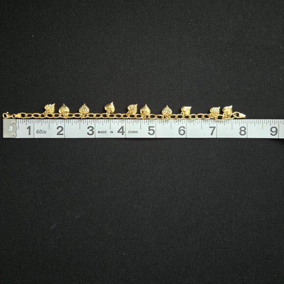 18k gold bracelet with mutiple heart charms Part 1 - Picture 11 of 13